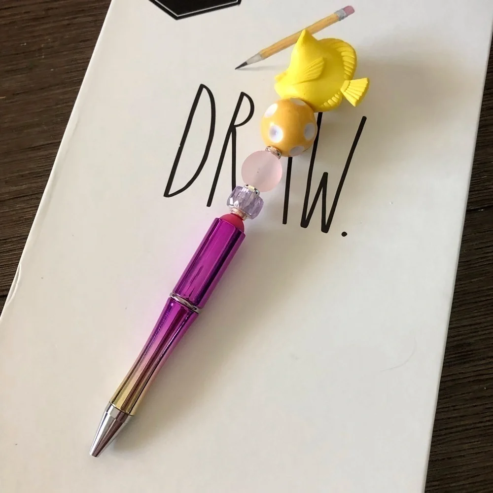 Disney Doorables: Finding Nemo: Bubbles handmade beaded pen
